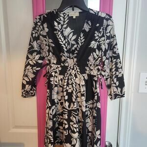 black and cream midi floral print dress with side bow tie detail